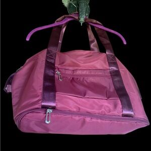 Cranberry color, travel bag for women
Brand new with tags